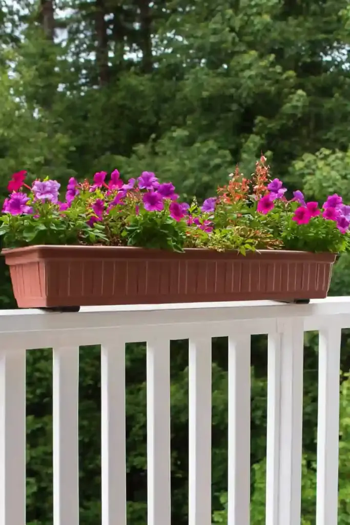 25 Cheap Landscaping Fixes That Look Expensive 7. 🌿 Deck Railing Planters to Maximize Small Spaces