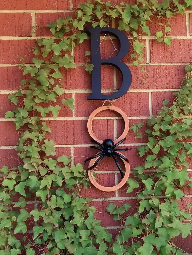 10 Repurposed Projects for a Whimsical Fall Garden 4. Floating Sign with Copper Address Numbers