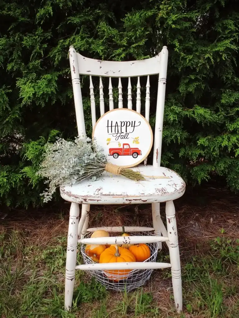 10 Repurposed Projects for a Whimsical Fall Garden 5. Vintage High Chair Display
